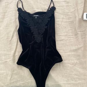 Size S black velvet tank body suit from express.
